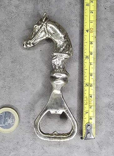 Bottle opener - , in