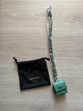 Étui à écouteurs, Mini