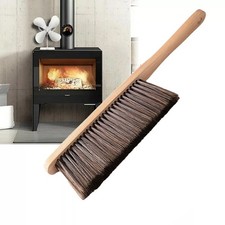 Cette brosse à poils à manche en bois design unique est essentielle pour les c