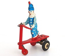 CLOWN SUR TROTTINETTE TRICYCLE