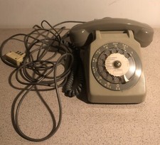 Ancien téléphone beige à
