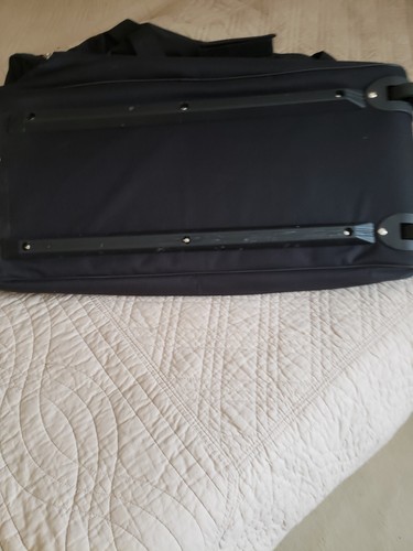 Sac voyage roulettes - à,