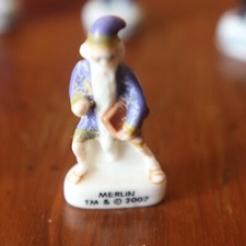 Ancienne feve DISNEY MERLIN L'