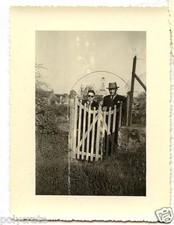 Two men at the gate - old film