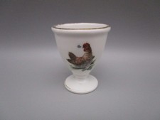 Coquetier ancien en porcelaine