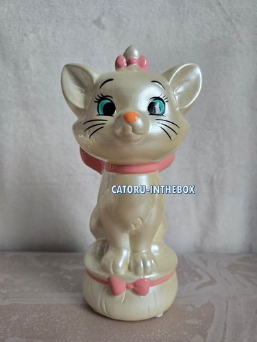 Figurine tirelire figure - /,