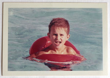 Boy pool buoy colors - vintage photo snapshot c. 1970 ?