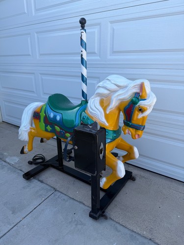 Coin operated carousel horse - operated,
