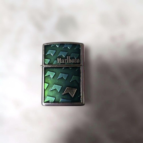 Briquet huile zippo - à,