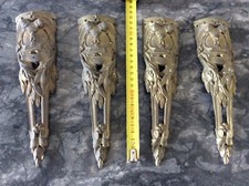 4 anciennes chutes en bronze