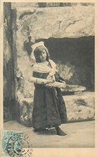 CP LITTLE GIRL WEARING WOOD BEECH NEAR FIREPLACE