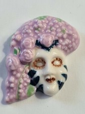 (E) Fève masque carnaval 