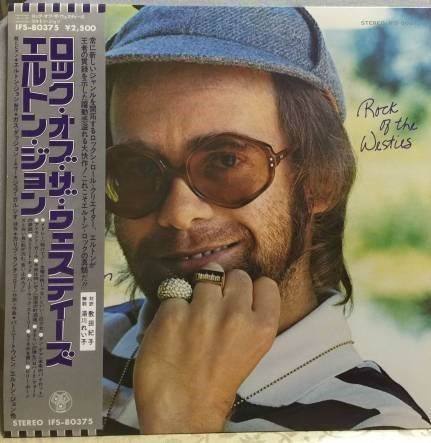 Elton john rock of the - -,