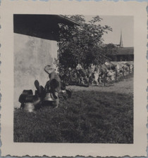 Switzerland, Reichenbach, boy carrying cow bells (bells), wine print