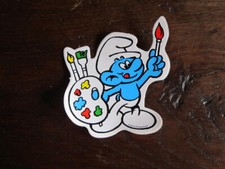 AUTOCOLLANT  SCHTROUMPF LE SCHTROUMPF PEINTRE ANNEE 1978