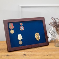 MILITARIA wooden display case with vertical presentation function.