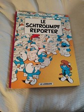 LE SCHTROUMPF  REPORTER E O
