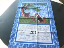 1 torchon  vintage en coton  calendrier 2010 à décors de chien , chats , lapin