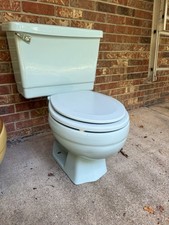 Vintage Powder Blue Bathroom commode.  (Universal Rundle) 1976