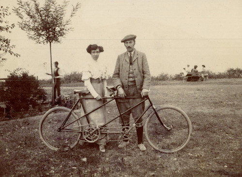 Men women and tandem bike - a,