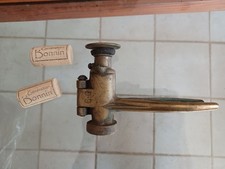 boucheuse à main en laiton