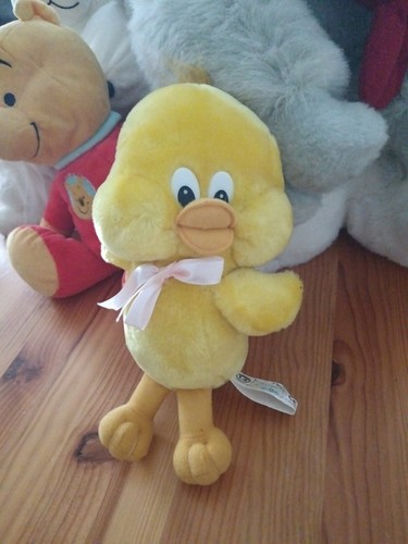 Titi jaune peluche - un,