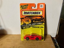 Matchbox 1993 MB 51 Porsche 959 color is red with black graphics & gold rims.