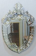 Venetian mirror in oval crest in glass engraved with flowers and leaves, 1940