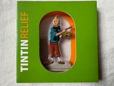 Figurine relief métal plat