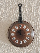 Pendule style poêle à frire