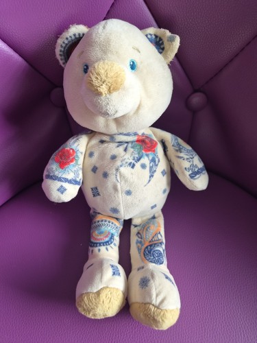 Doudou peluche ours blanc