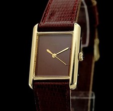 Montre Sandoz tank bordeaux/or vintage