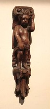 cariatide en bois sculpté