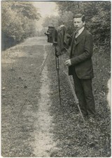 Young man film photo and camera circa 1920