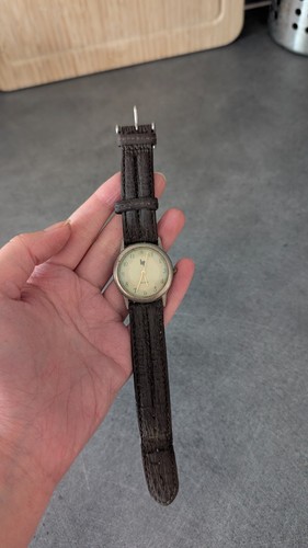 Montre quartz ancienne - hp,
