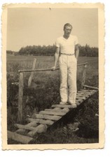 Man standing bridge bridge - antique amateur photo year. 1934