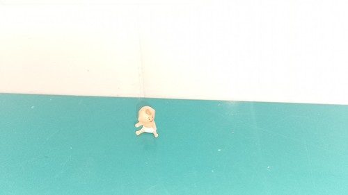 Polly pocket figurine doll