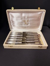 Service couteaux Christofle rubans croisés métal argenté 12 pièces