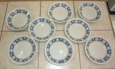 8 ASSIETTES CREUSES porcelaine