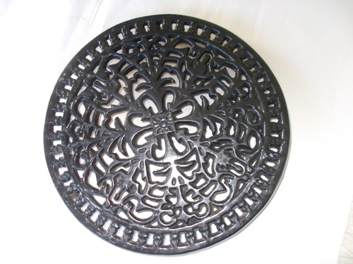 Dessous plat rond en fonte - de,