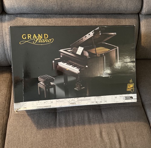 Grand piano queue noir - à,