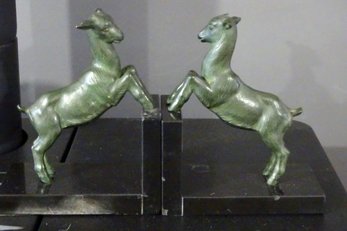 Serre livres statue - +,
