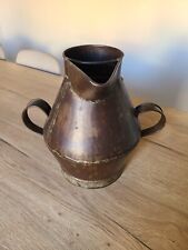 Broc ancien en zin . Début