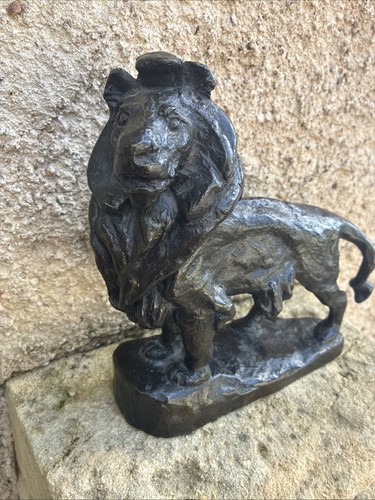 Lion bronze patiné - en,