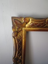 Cadre ancien en bois sculpté doré