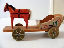 nice little trolley with 1 horse in very good condition all wooden 4 wheels.