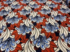 Tissu Wax beige à fleurs bleu orange