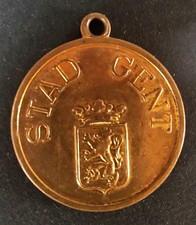 Jeton à bélière d'agent de police belge "Stad Gent / Politie 487"