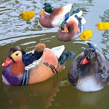 Paire de statues de canards