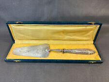 Ancienne pelle à tarte en métal argenté et manche en argent fourré et coffret